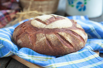 Round Loaf of Home made Bread made from rye, whole wheat flour 