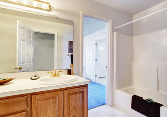 simple bathroom with full bath shower.