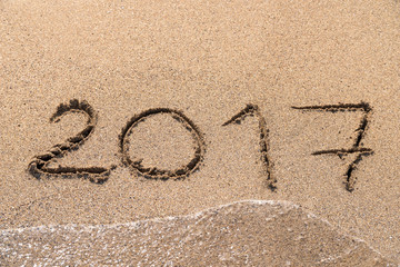 Year 2017 Written On Beach Sand