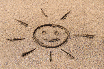 Children Drawing Of Sun Sign On Summer Beach Sand