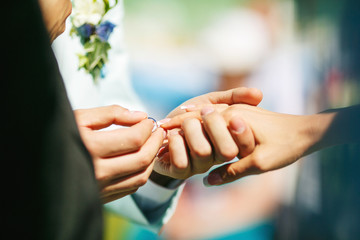 Putting the ring on her finger