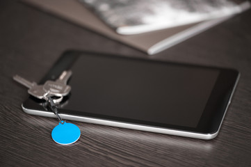 Tablet PC and NFC tag on the table