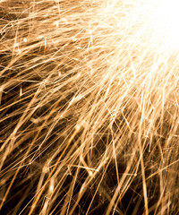 Fire spray from sparklers, macro