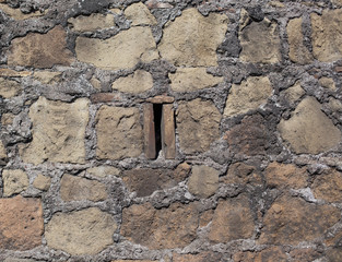 Antique textured wall from stone in Rome