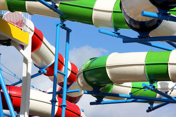 Brightly coloured slides in a water park in the Algarve Portugal.