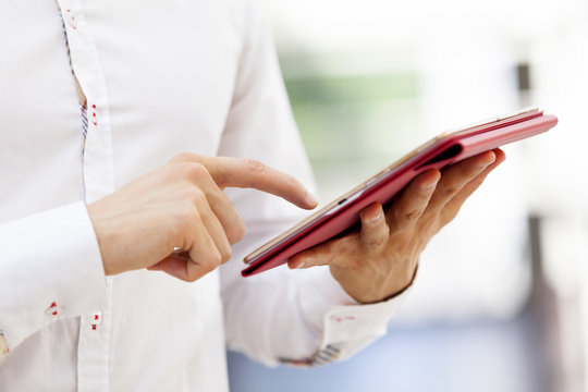 Man holding a digital tablet at the office