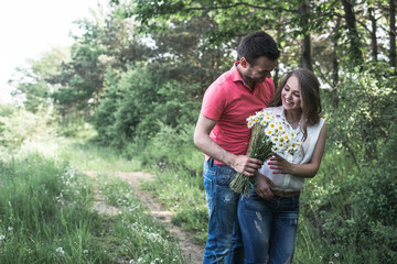 Cute couple in a forest