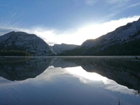 Time lapse footage with motion of sunrise at reflective lake along Tioga Pass in Yosemite National Park, California