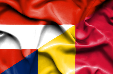 Waving flag of Chad and Austria