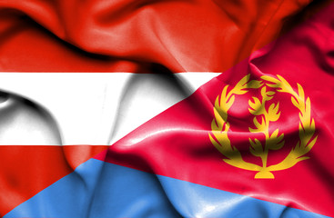 Waving flag of Eritrea and Austria