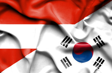 Waving flag of South Korea and Austria