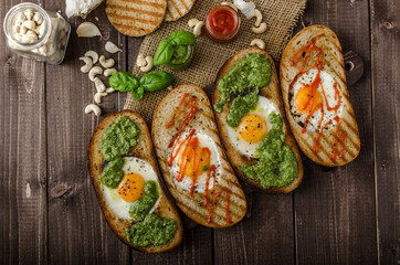 Vatiations of fried eggs inside bread