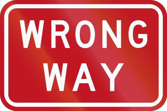 An Australian traffic sign on freeway: Wrong Way