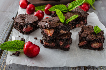 Chocolate brownies with cherries