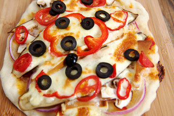 Home made vegeterian margarita pizza on table