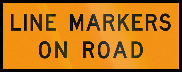 An Australian temporary roadwork sign - Line markers on road