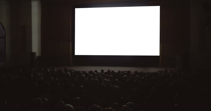 People enjoying the film in cinema