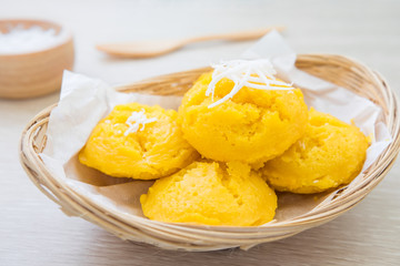 Thai dessert sugar palm cake with coconut in basket