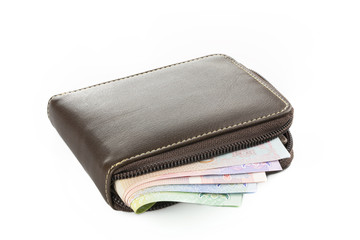 Wallet with money isolated on white background.