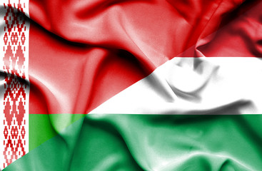 Obraz premium Waving flag of Hungary and Belarus