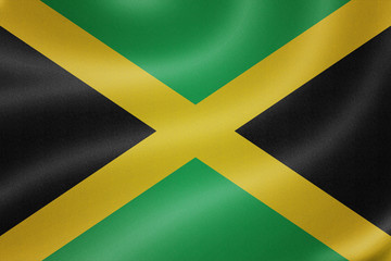 Jamaica flag on the fabric texture background