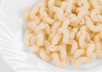Close up of pasta cavatappi on a white plate. 