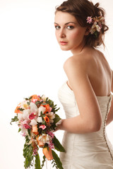 Bride glanses over her shoulder