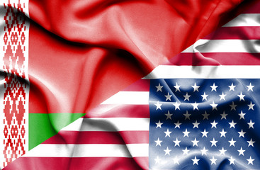 Waving flag of United States of America and Belarus