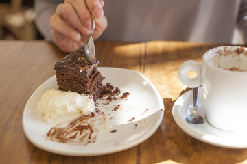 taking chocolate cake