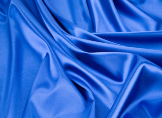 Close up of blue silk. Texture.