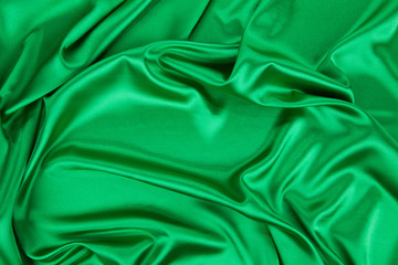 Green silk cloth some soft folds.