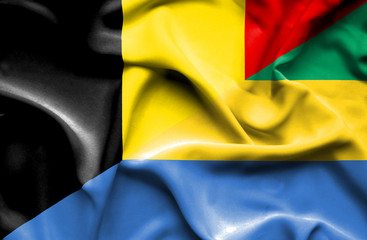 Waving flag of Gabon and Belgium