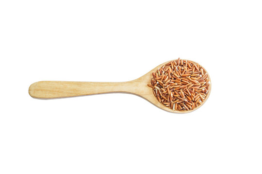 rice on wooden spoon isolated on background. Product of Thailand