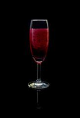 Red drink a glass of champagne.