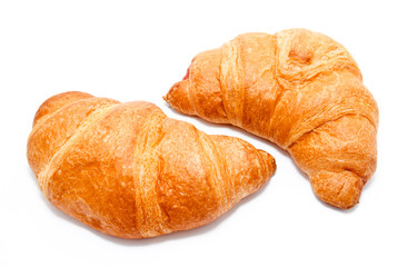 Two fresh perfect croissants isolated