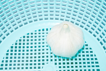 garlic in plastic basket