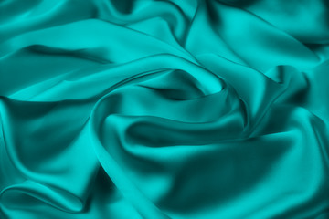 abstract background luxury cloth or liquid wave or wavy folds of grunge silk texture satin velvet material or luxurious
