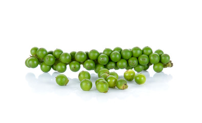 Green peppercorns isolated on the white background