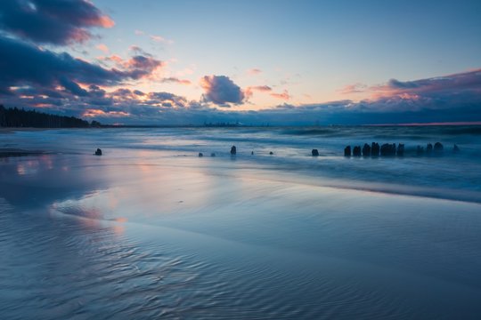 Beautiful seascape with Baltic sea shore after sunset