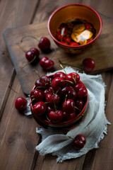 Still life with sweet cherries in a rustic setting, studio shot