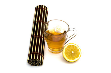 glass of yellow drink, treatment by herbs