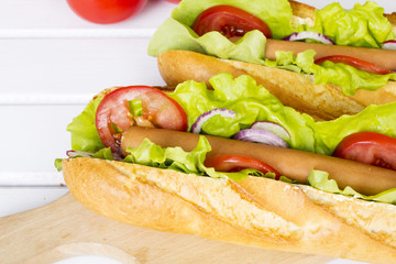 hot dogs on a wooden table