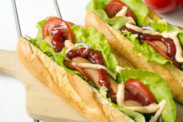 hot dogs on a wooden table