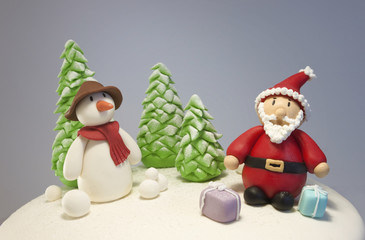 Fondant snowman and santa characters