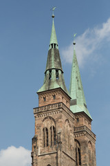Fototapeta na wymiar spires of the medieval St.Sebuldus Church in Nuremberg, Germany