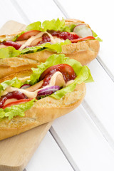 hot dogs on a wooden table