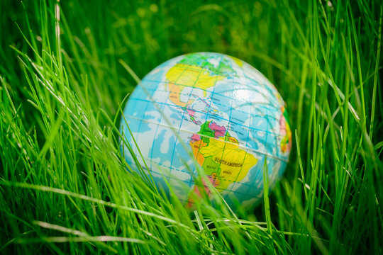 globe on grass. earth day, environment concept