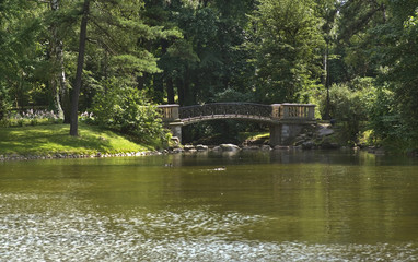 Fototapeta na wymiar Bridge in Lazienki park in Warsaw. Poland 