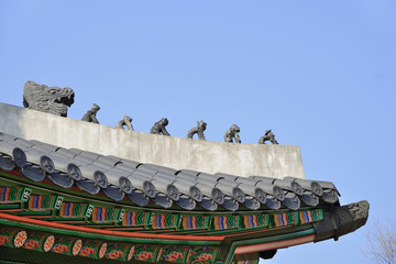 Clay dolls on the roof corner of korean traditional architecture