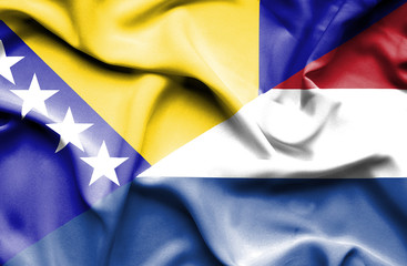 Waving flag of Netherlands and Bosnia and Herzegovina